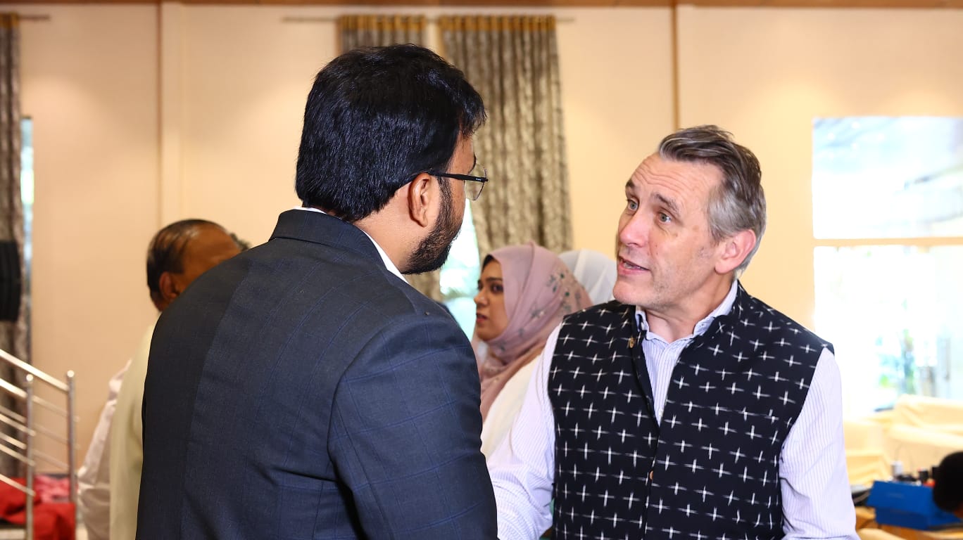 In conversation with an international partner at an industry event
